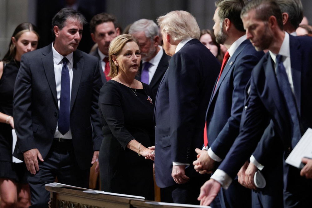Darline Graham, pictured shaking hands with President Trump at Lindsey Graham’s funeral, has enjoyed the full support of the president as she pursues the South Carolina senator’s seat for a full six-year term (Reuters)