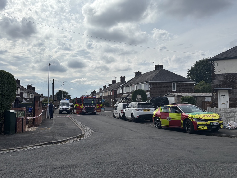 Emergency services at four houses that were damaged by a grass fire on Sandy Road, Stoke-on-Trent (Stephanie Wareham/PA) (PA Wire)