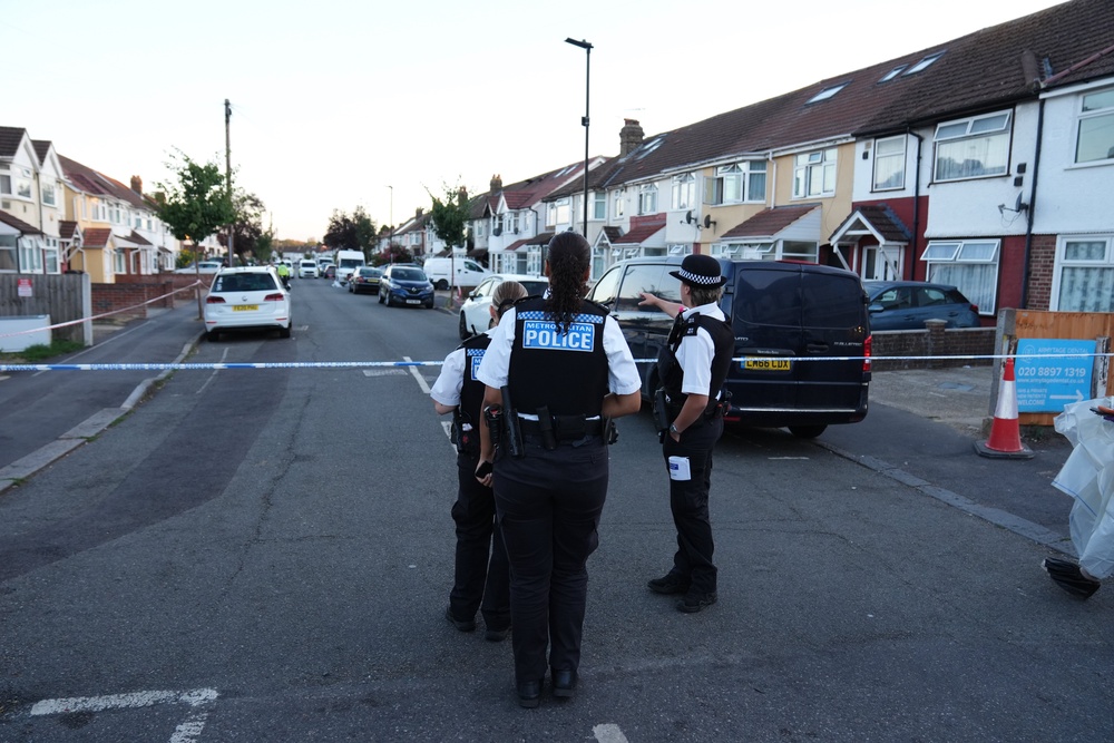 Police at the scene of the fire on Berkeley Avenue (Ben Whitley/PA) (PA Wire)