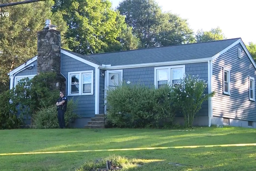 A handgun found near her body was not a Worcester police service weapon, and investigators were working to determine who owned it (WCVB-TV)