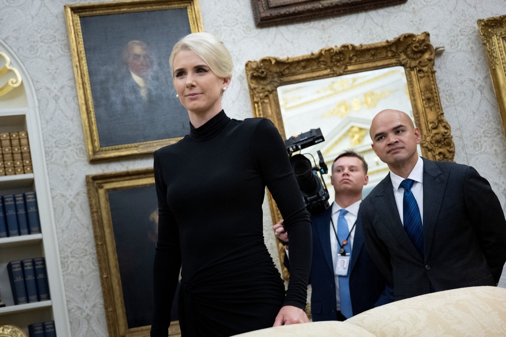 A former television presenter, Harp has attracted considerable attention in recent months over what some observers describe as her intense devotion to Trump and her expansive influence within his inner circle (AFP via Getty Images)