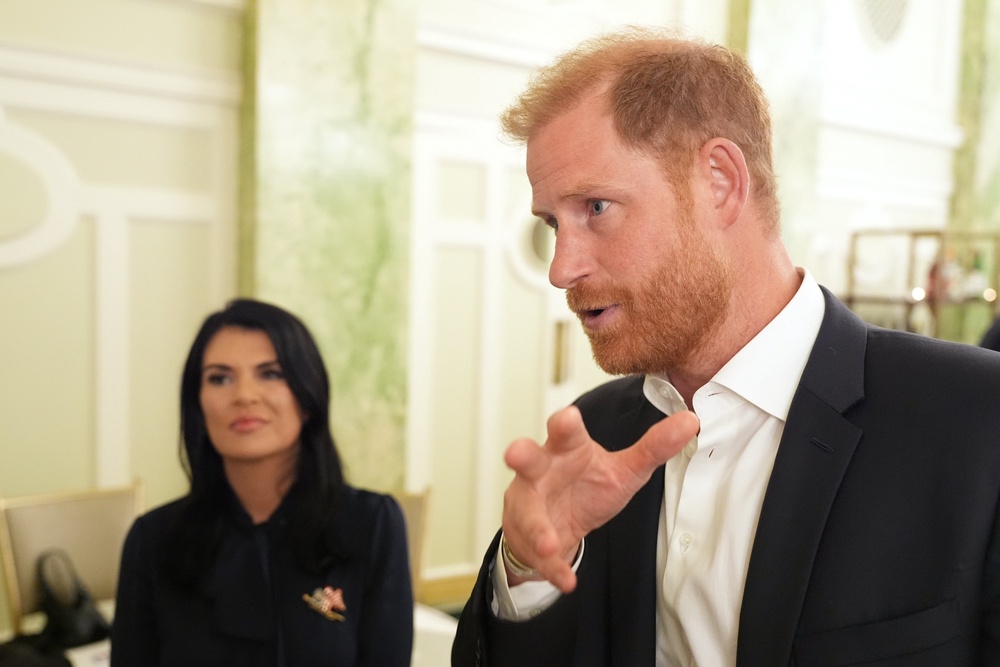 Britain's Prince Harry, the Duke of Sussex, speaks to The Associated Press after a roundtable about support for veterans, Wednesday, Aug. 19, 2026, in Washington, as Sarah Verado, CEO, of The Independence Fund, listens. (AP Photo/Alex Brandon) (Copyright 2026 The Associated Press. All rights reserved)