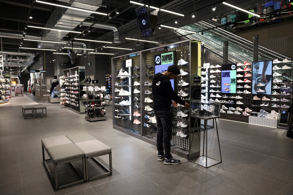 JD Sports said pressure on consumer spending hit footwear sales, particularly for hotly anticipated launches or limited-edition trainers, and amid an increased level of discounting (Reuters)