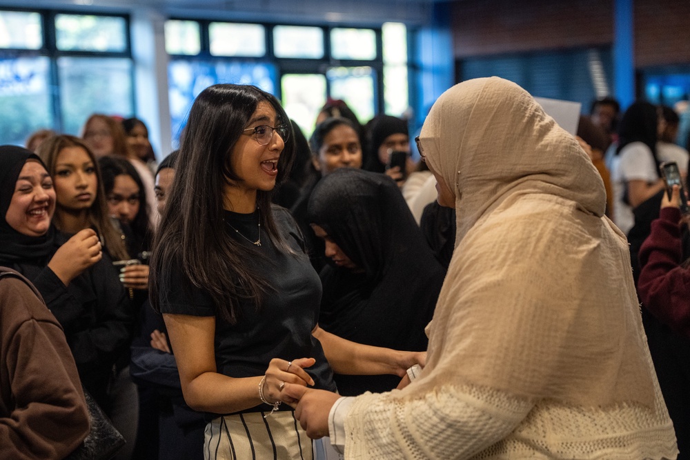 Pupils celebrate after receiving their GCSE results at Plashet City of London Academy (Getty)