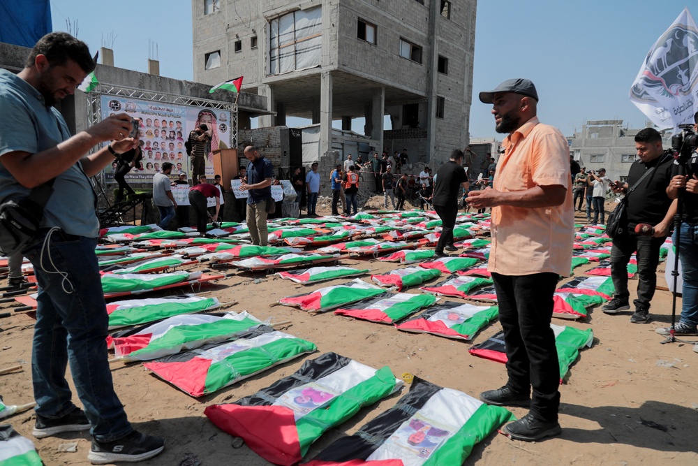 A mass funeral in Gaza in August 2026 when the remains of bodies are recovered from the rubble (AFP/Getty)