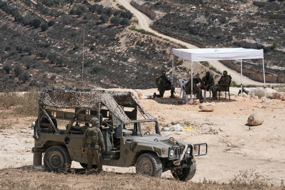 Settler attacks on Palestinians have skyrocketed in 2026, with the United Nations warning in July that it has hit an “all-time high”, as the Israeli government continues to approve new settlements (AP)