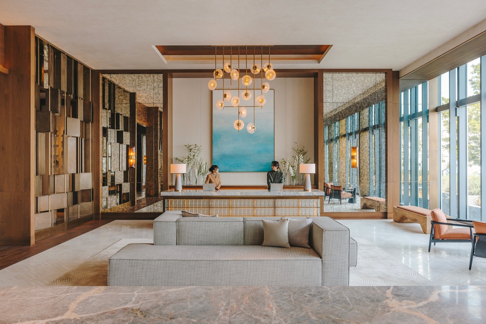 Floor-to-ceiling windows. and bespoke lighting creates an airy reception space (Fairmont Tokyo)