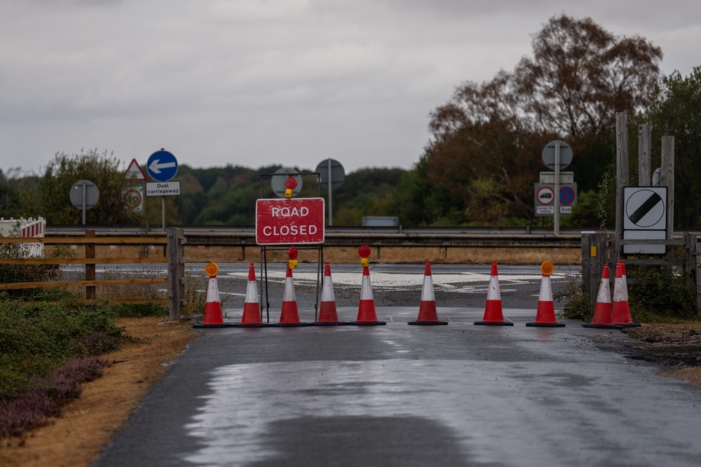 An entrance to the A31 road is blocked off following a wildfire in the New Forest national park (Getty)