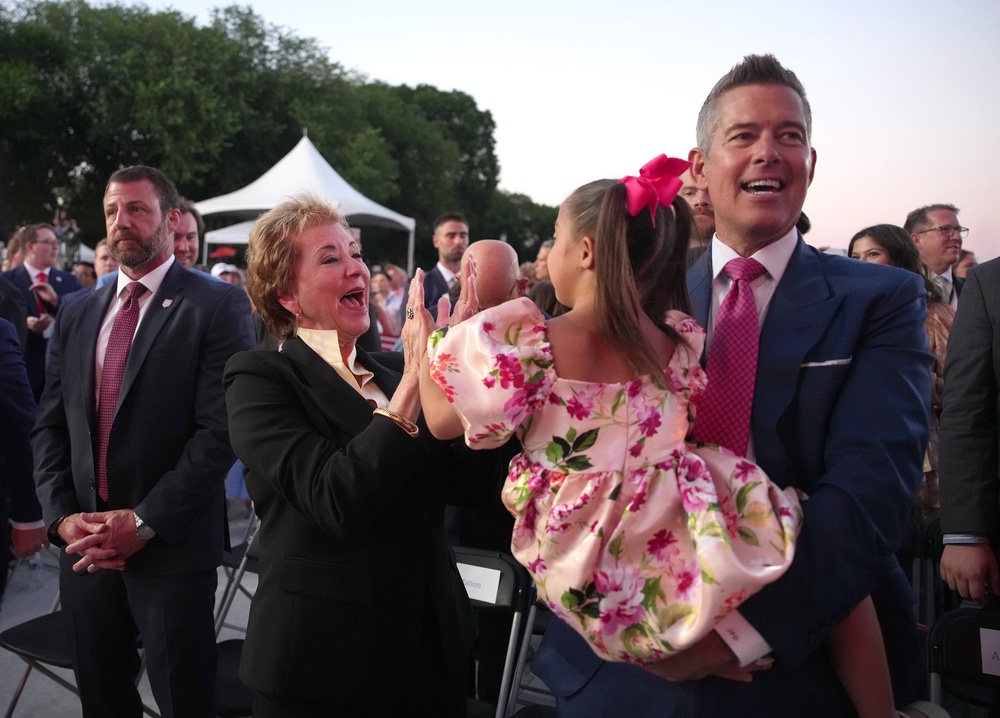 The AI image appeared to depict the president alongside Education Secretary Linda McMahon (left) and Transportation Secretary Sean Duffy (right) (Getty)