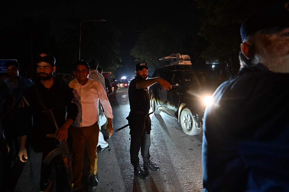 Security personnel cordon off a street outside the Shifa International Hospital in Islamabad on 20 August 2026 (AFP/Getty)