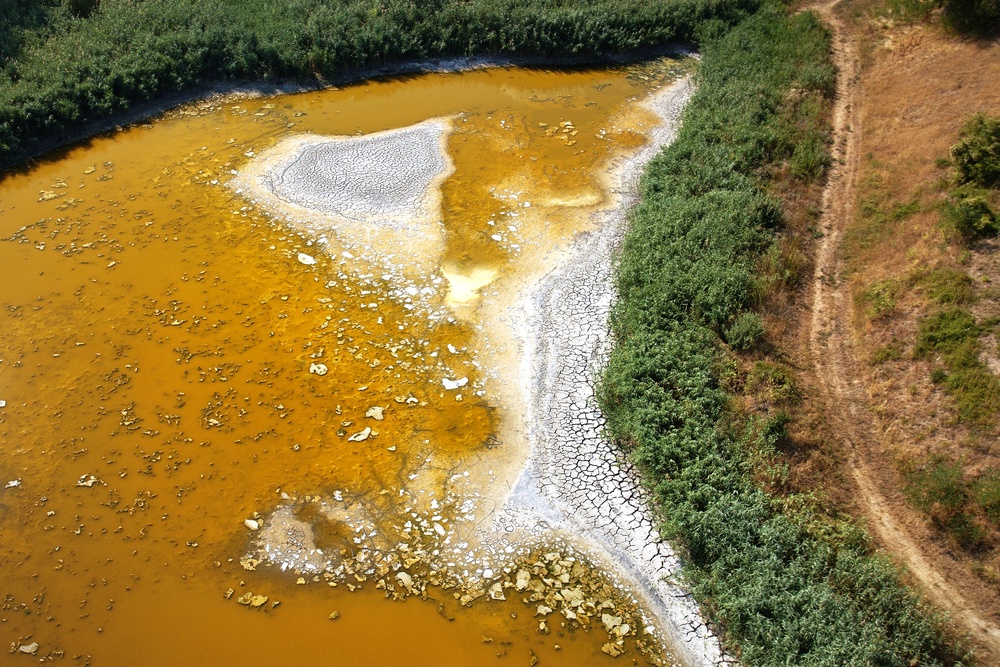 The bed of Lake Garancsi is exposed as the popular tourist destination near Budapest after the lake died out following an extended drought period near Tinnye, Hungary, on Aug. 8, 2026. (AP Photo/Bela Szandelszky) (Copyright 2026 The Associated Press. All rights reserved.)