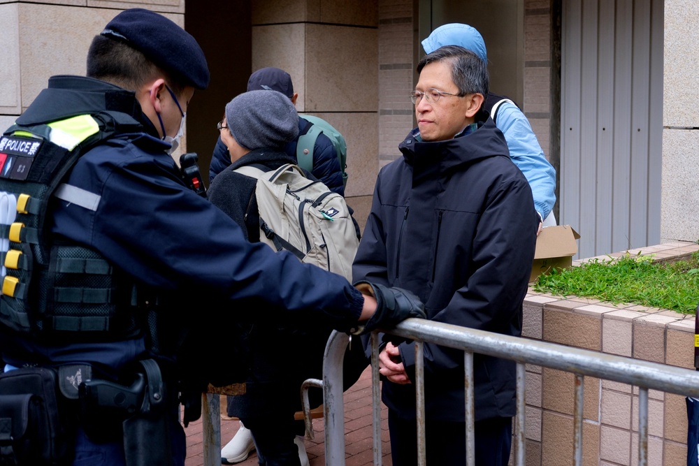 Tang Ngok-kwan (R), a Tiananmen vigil activist and former committee member for Hong Kong Alliance in Support of Patriotic Democratic Movements of China (AFP/Getty)
