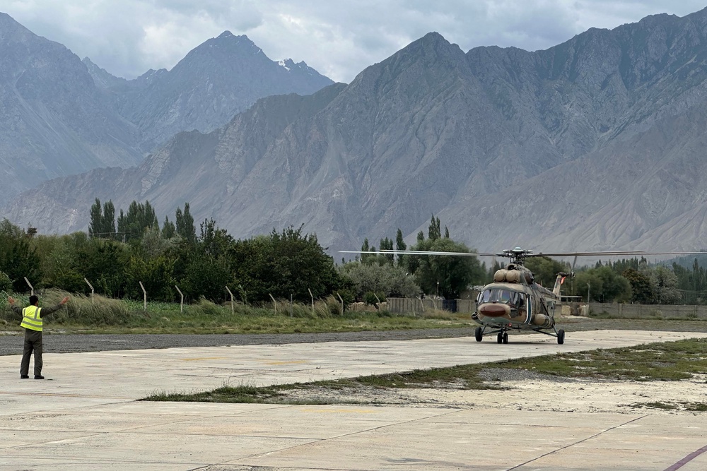A Pakistani army helicopter carrying the bodies of the deceased climbers, lands at a military base in Skardu in Pakistan's Gilgit-Baltistan on August 6 (AFP/Getty)