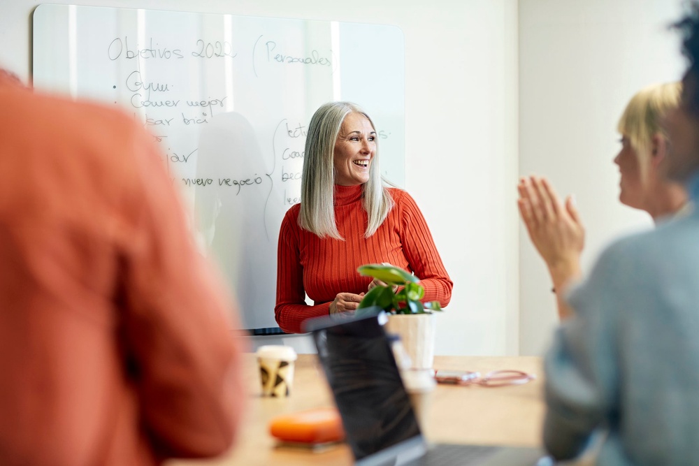 Midlife women are thriving in working environments despite the recruiting systems often being engineered against them (Getty/iStock)