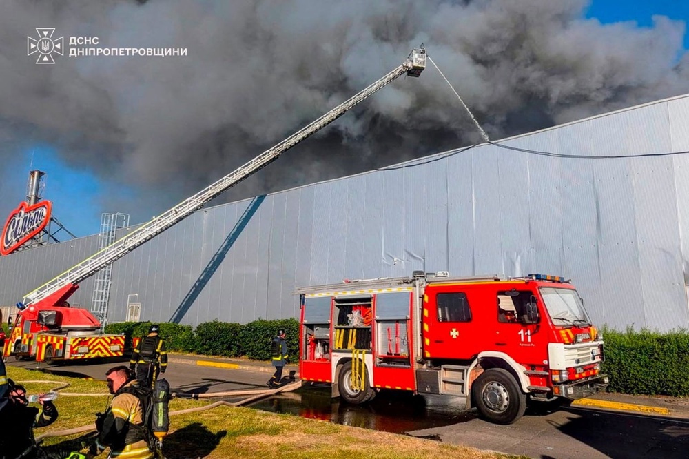 Firefighters work at a site of a shopping centre hit by a Russian drone attack in Kryvyi Rig, Dnipropetrovsk region, Ukraine (Emergency Service of Ukraine)
