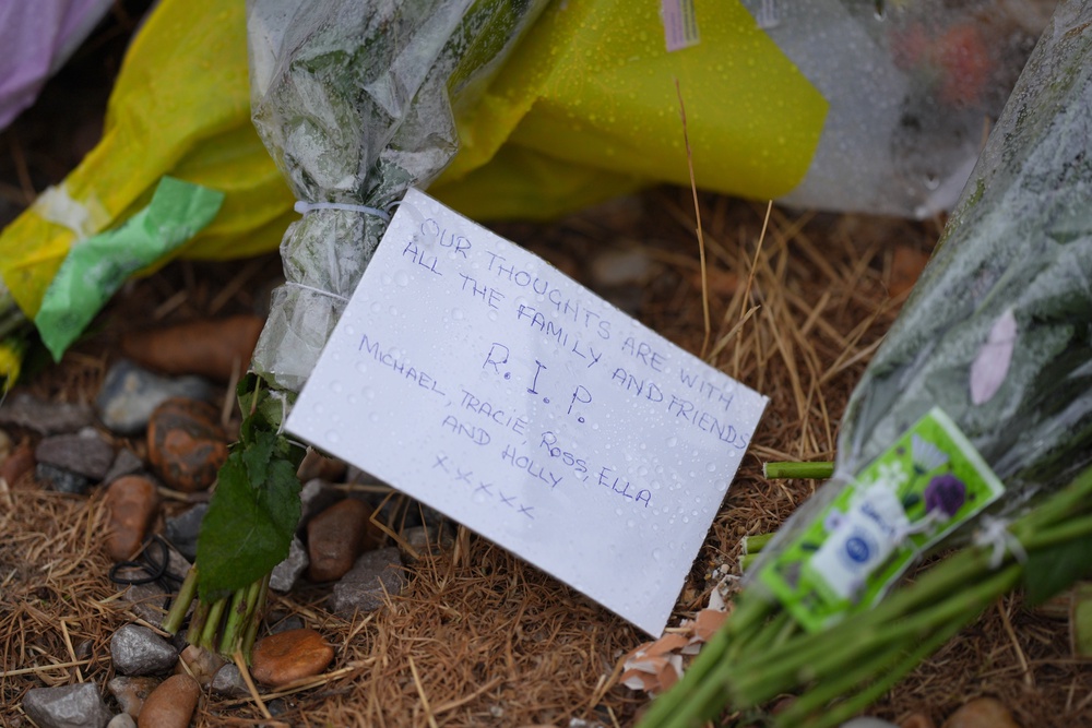 Floral tributes on the beach (Yui Mok/PA) (PA Wire)