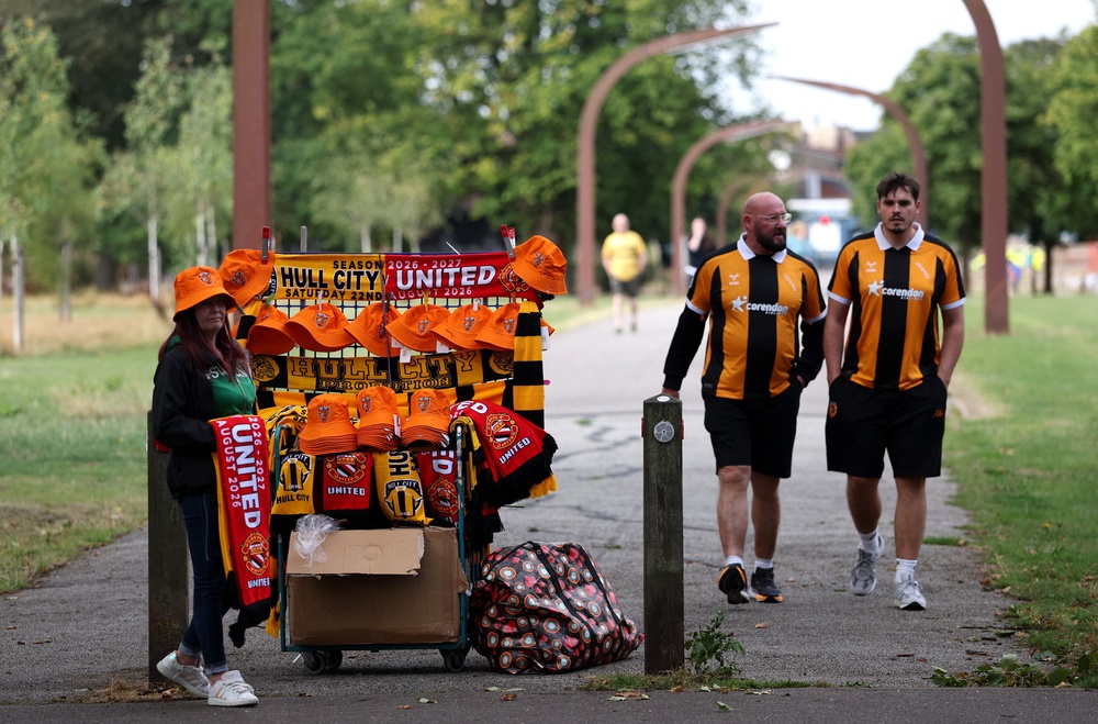 Hull City fans approach the MKM Stadium before Man Utd test in opener (Reuters)