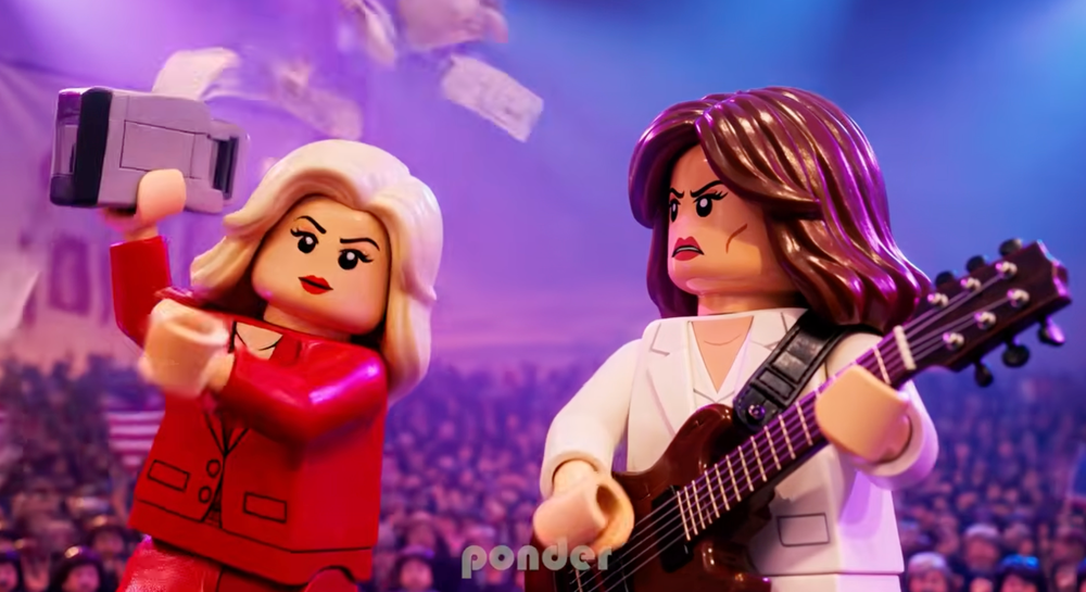 In the AI-generated music video, a Lego version of First Lady Melania Trump (right) looks on with anger at Natalie Harp (left) as she prints out positive news for President Trump (drew_ponder / YouTube)