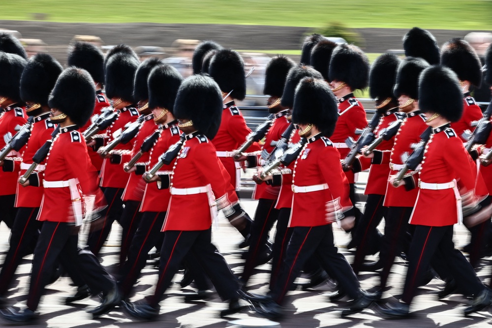 The Coldstream Guards parade during the state opening of Parliament in London on 13 May (AFP/Getty)