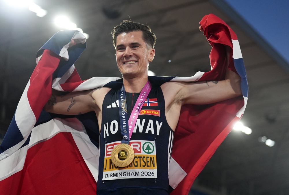 Jakob Ingebrigtsen of Norway with his medal after winning gold during the Men's 5000m Final (PA)