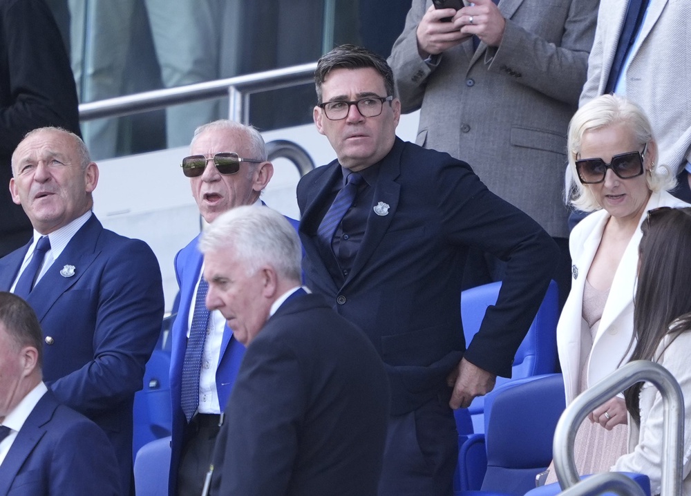 Prime Minister Andy Burnham (centre) in the stands ahead of the the Premier League match at the Hill Dickinson Stadium, Liverpool (Peter Byrne/PA) (PA Wire)