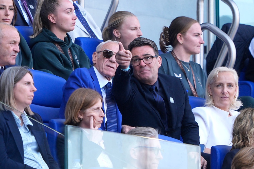 Prime Minister Andy Burnham (right) with former Everton player Peter Reid (PA)