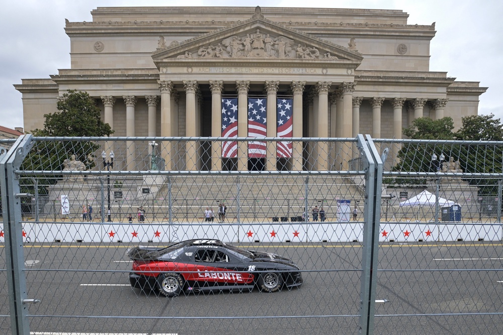 Bobby Labonte passes the National Archives during a practice for the International Race of Champions Racing Series (AP)