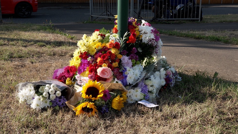 Flowers left near the scene on the A66 in South Bank (PA)