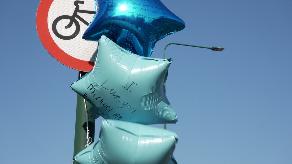 Balloons with messages left near to the scene (Richard McCarthy/PA) (PA Wire)