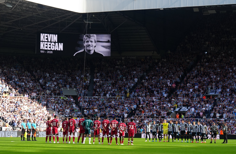 Both teams pay respects to the late Keegan with a minute's applause (PA)
