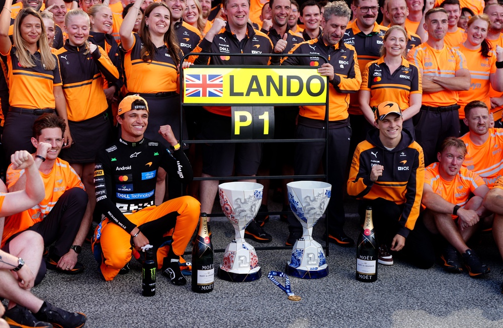 Norris celebrates with his McLaren team (David Davies/PA) (PA Wire)