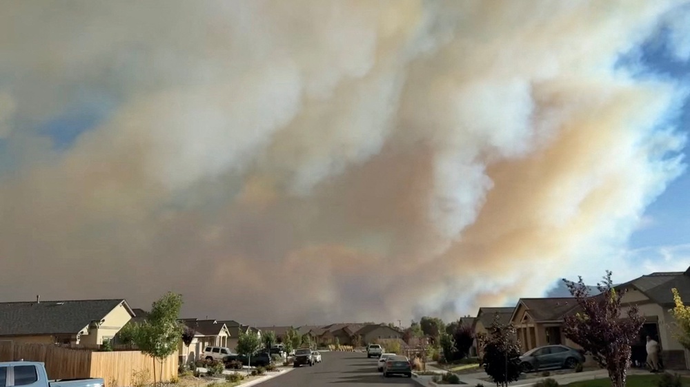Smoke rises from Hawk fire in Reno (Reuters)