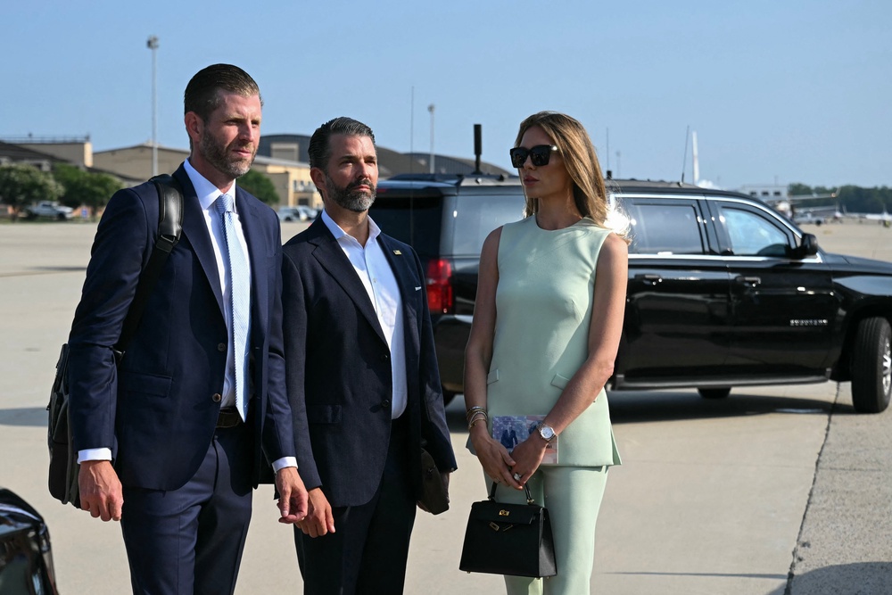 Eric and Donald Trump Jr. have largely taken over their father's financial interests since he returned to political life (AFP/Getty)