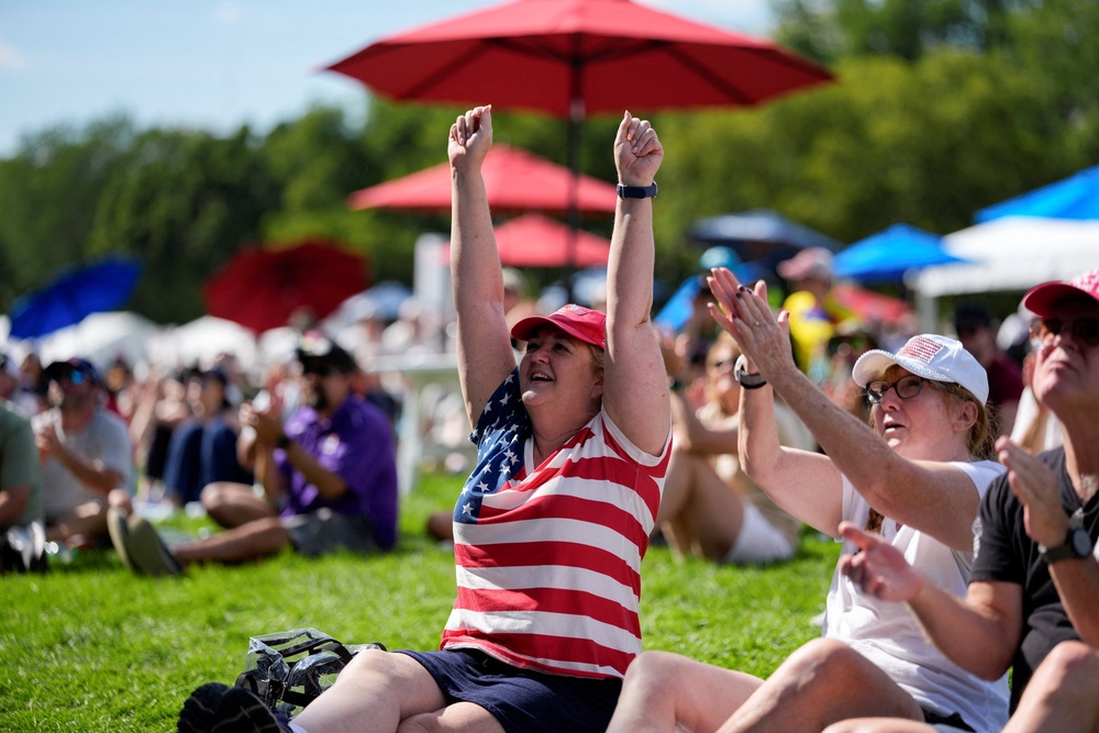 Spectators watched the IndyCar race take place on large screens on the National Mall (Reuters)