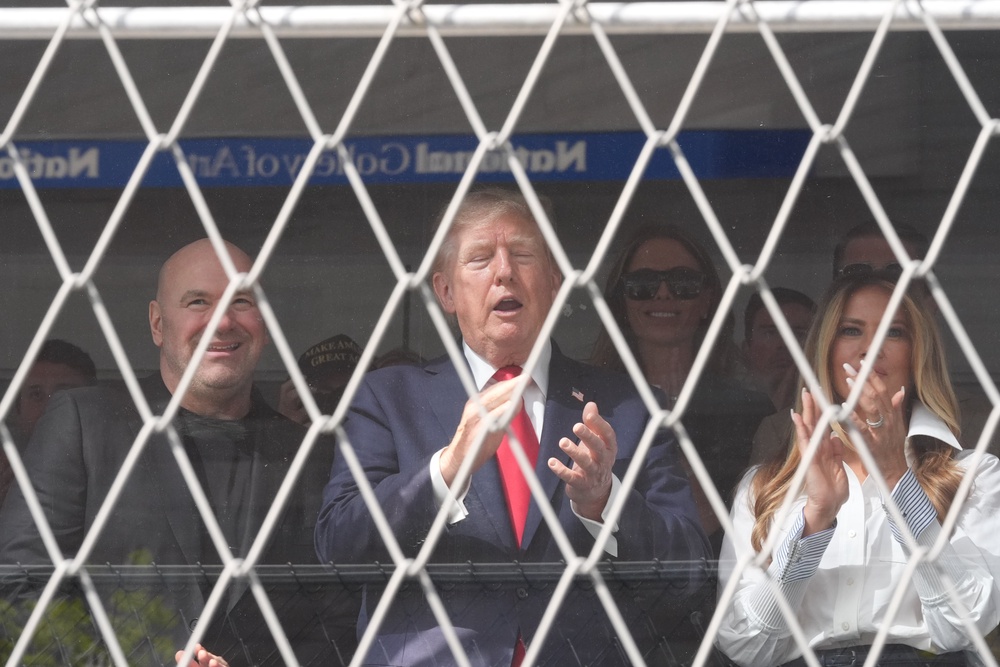 Various Trump allies, including UFC CEO Dana White, sat with the president as he cheered on the 25 drivers competing in the Freedom 250 Grand Prix (AP)