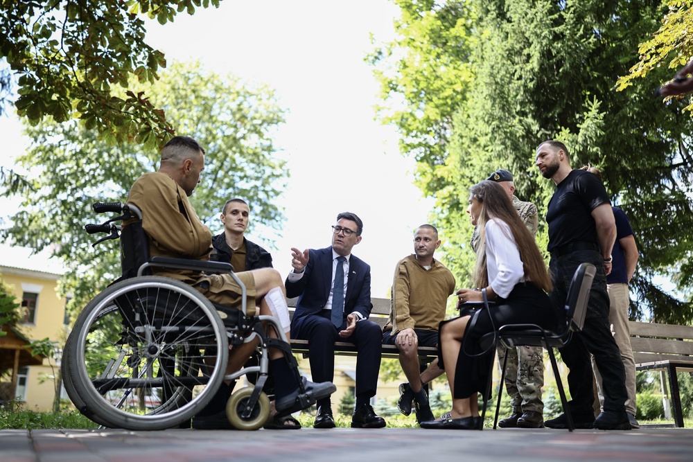 Mr Burnham met patients wounded in the war at the Main Military Hospital, supported by the David Nott Foundation (Henry Nicholls/PA) (PA Wire)