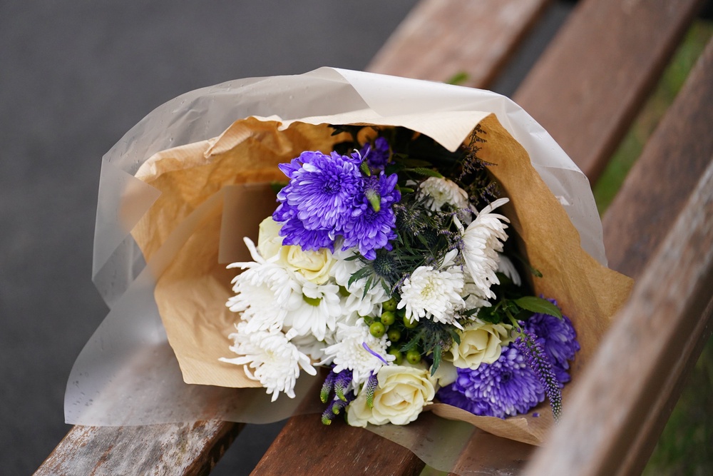A floral tribute left outside Jacobs House at the time of the incident (Jordan Pettitt/PA) (PA Archive)