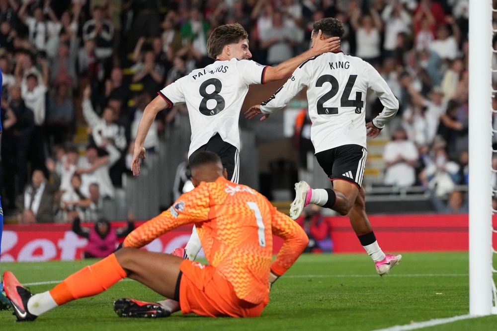 Josh King (right) turned the game on its head for Fulham (AP)