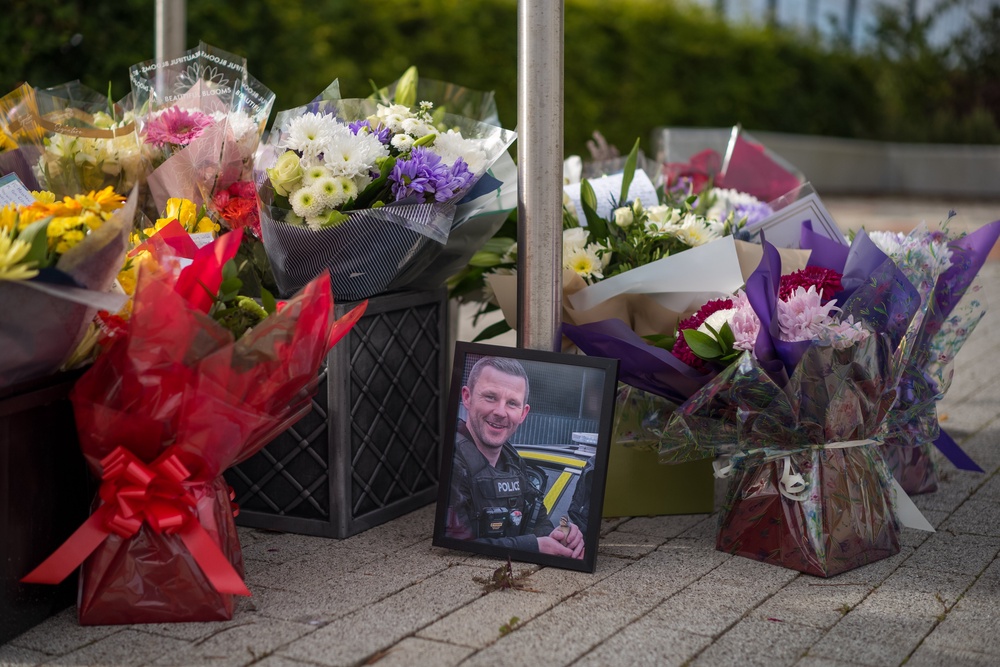 Floral tributes left at the scene for the two police officers (Getty)