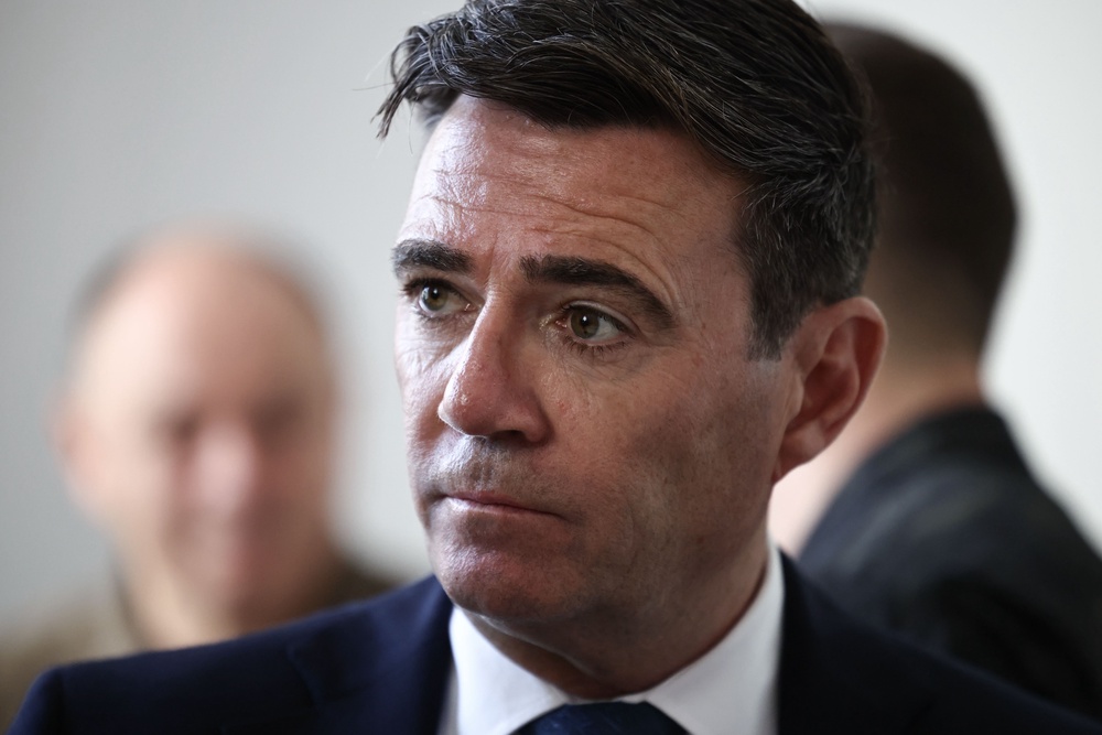 Prime minister Andy Burnham has pledged a £10bn package to build tens of thousands of homes (PA Wire)