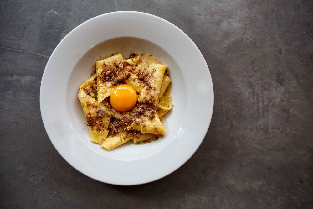 Bancone’s silk handkerchief pasta with walnut butter and confit egg yolk remains the dish most associated with the group (Bancone)