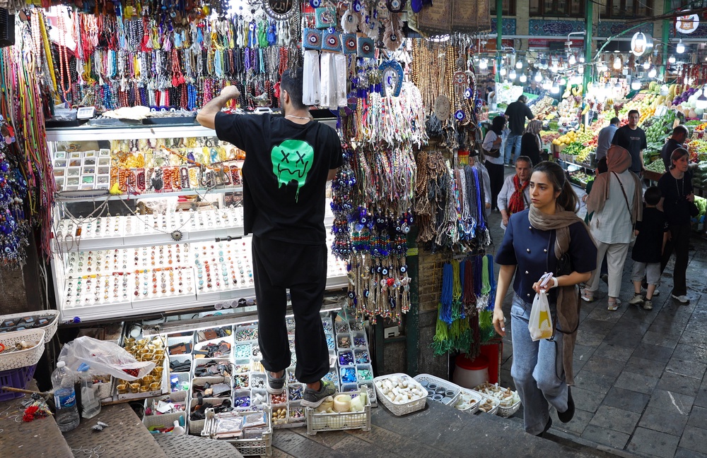 People shop for produce at the historic Tajrish bazaar in northern Tehran (AFP/Getty)