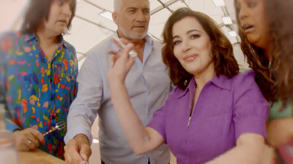 Nigella Lawson can be seen making her Great British Bake Off debut alongside her new co-stars in a sneak preview at the Channel 4 baking show (Channel 4)