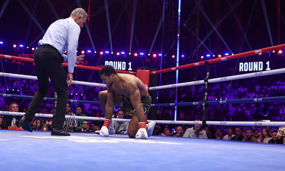 Joshua had to climb off the canvas to beat Prenga (Getty)
