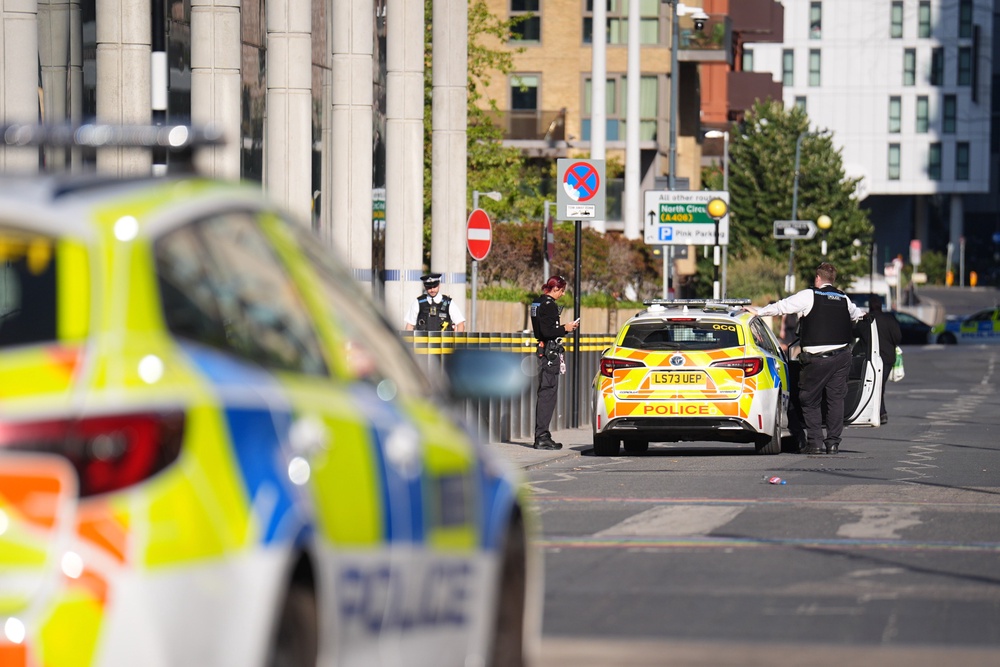 Police officers at the scene of a fatal stabbing at Brent Civic Centre (James Manning/PA) (PA Wire)