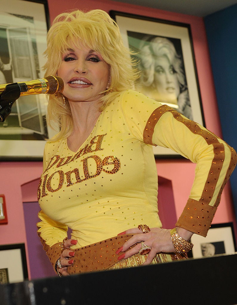 Dolly Parton takes questions from the fans and press during Dolly Parton's Trinkets & Treasures grand opening at Dolly Parton's Trinkets & Treasures on March 12, 2010 in Nashville, Tennessee (Getty Images)