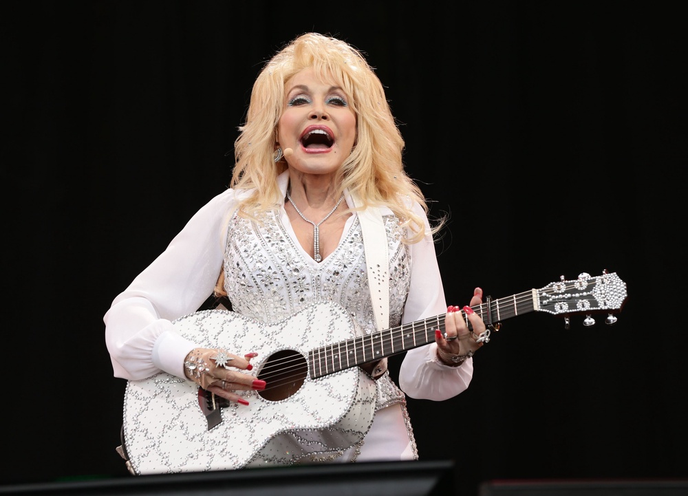 Dolly Parton performing on the Pyramid Stage at the Glastonbury Festival in 2014 (PA) (PA Archive)