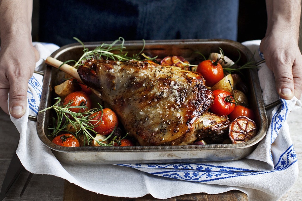 Lemon, garlic, olives and rosemary do the heavy lifting in this slow-roasted centrepiece (Ocado)