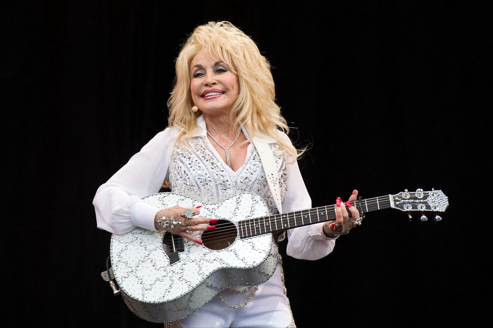 Parton wanted to be remembered as ‘a caring, giving, working girl’ (Alamy/PA)