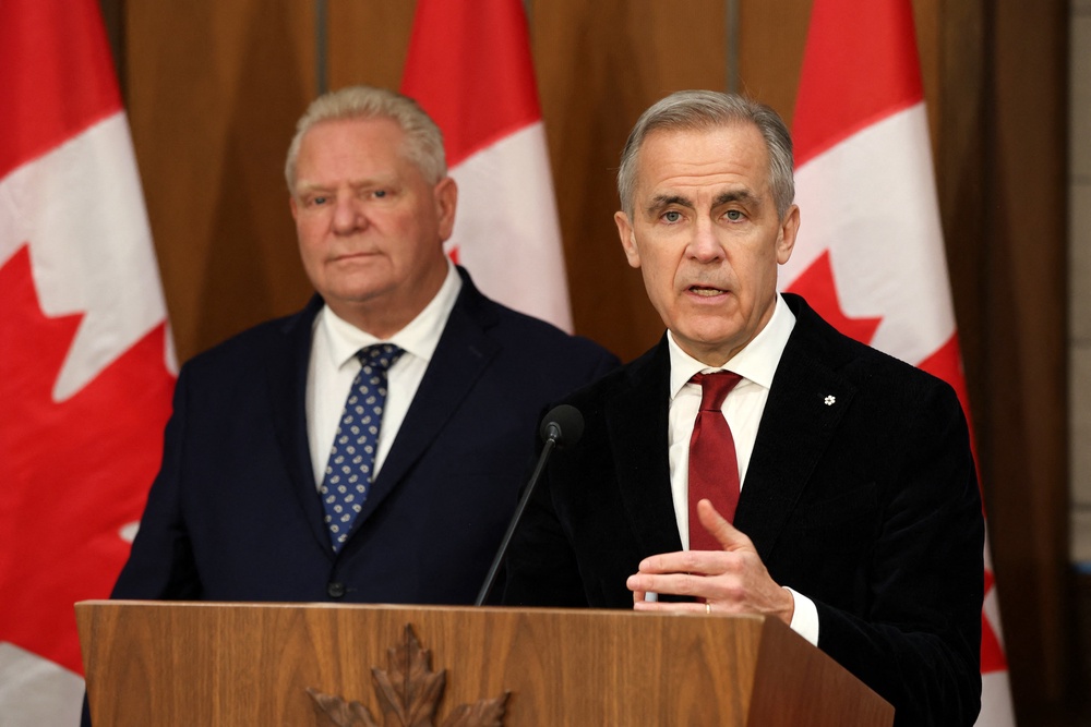 Canadian Prime Minister Mark Carney (right) likened Trump's new tariffs to an act of war, while Ontario Premier Doug Ford (left) labeled Trump a 'dictator' (AFP/Getty)